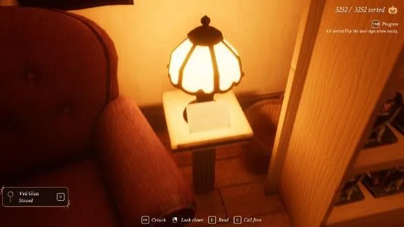 Tidy Up the Halloween Shop finding the postcard beside the lamp for Wish You Were Here